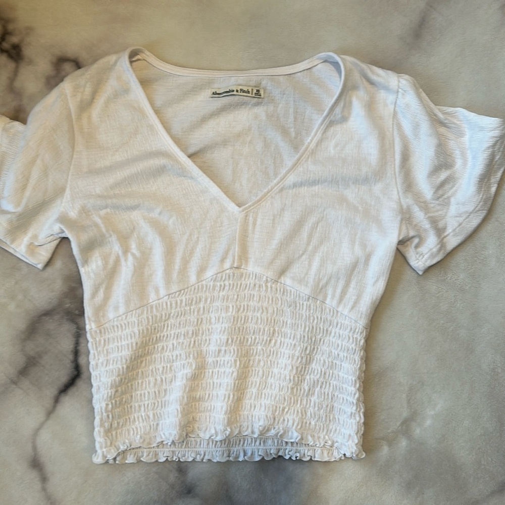 White smocked tshirt